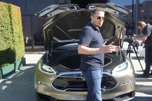 Elon Musk in front of the frunk